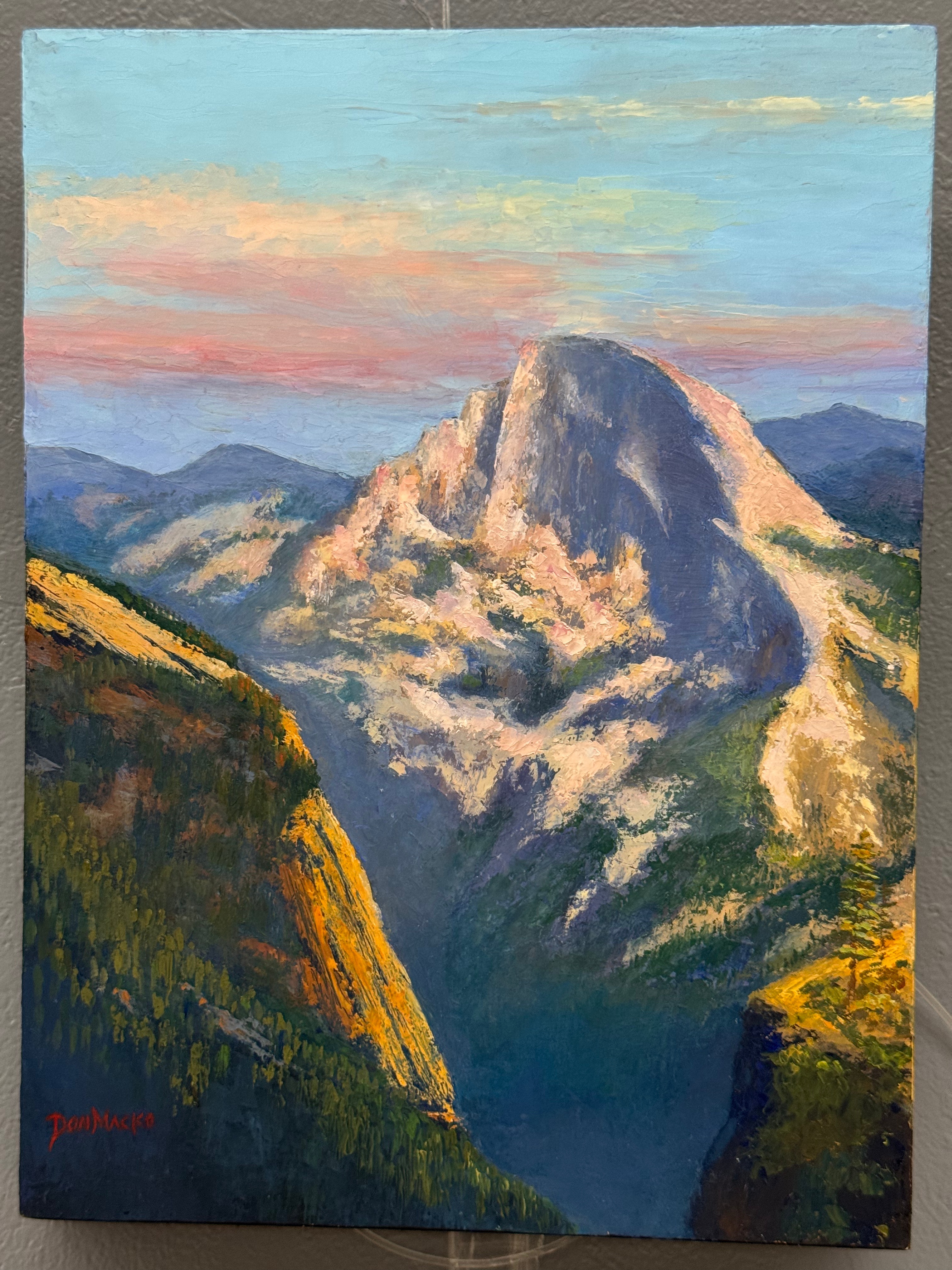 April 2025 winning artwork, an oil painting titled: "Halfdome From Above"